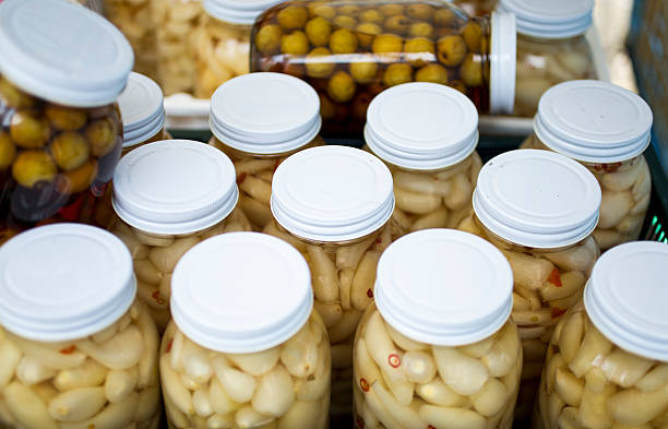 Jars of Japanese pickled leeks called Rakkyo and Umeboshi, which are pickled Japanese plums.