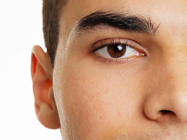 istock Human eye of young man close up 497620273