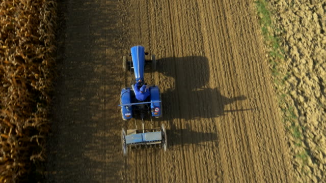 AERIAL Farmer Sowing The Field