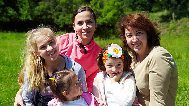 istock Family lying on the grass 497627762