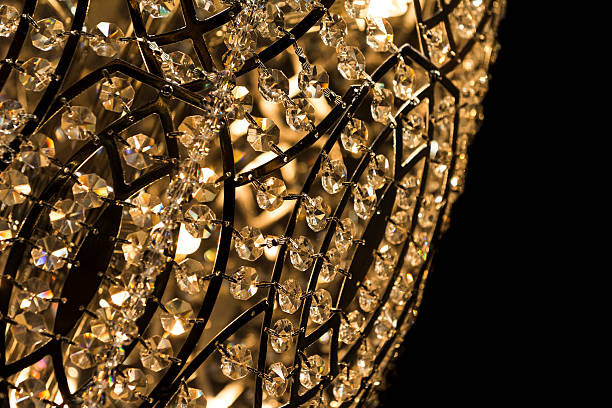 istock Noble chandelier with light candles and right dark background 497628784