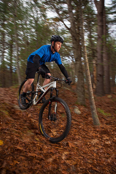 istock Mountain biker descending a trail in the fall 497629480