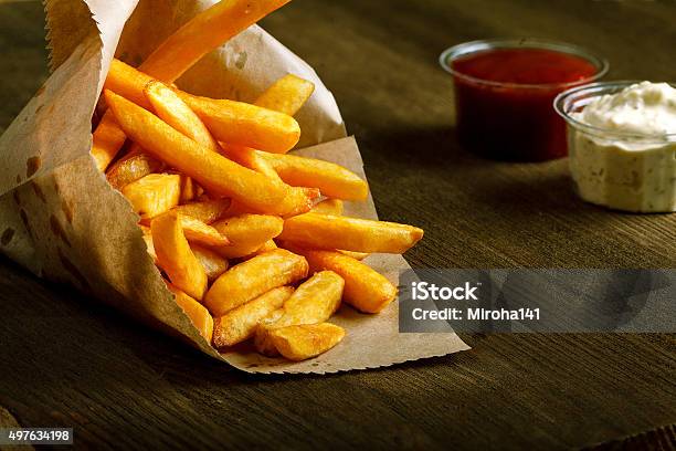 Fresh Fried French Fries With Ketchup On Wooden Background Stock Photo - Download Image Now