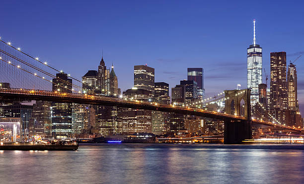 istock Manhattan waterfront at night, New York City, USA 497635234