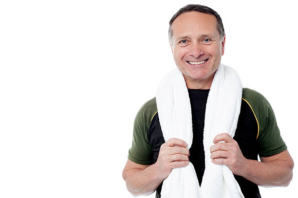 istock Fitness trainer with towel around his neck 497635705