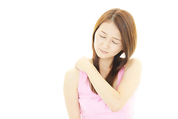 istock Young woman with shoulder pain. 497637625
