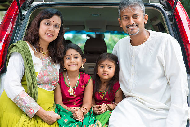 istock Indian family sitting in car. 497637663