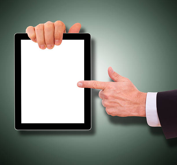 istock Hands holding point on digital tablet and screen. Isolated 497638315