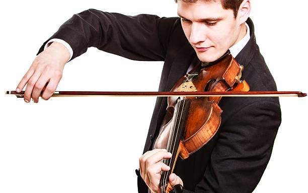 istock Man violinist playing violin. Classical music art 497638593