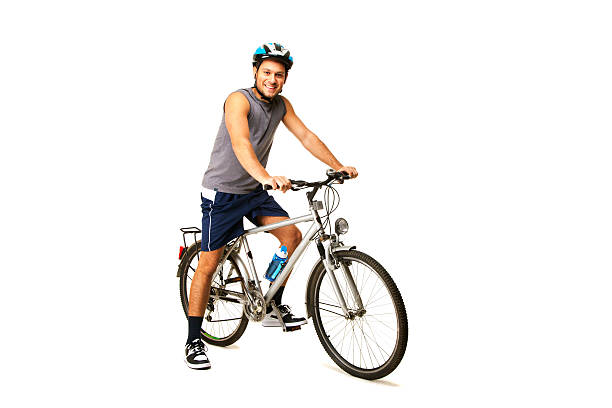 Teen on a  bike isolated on  white background