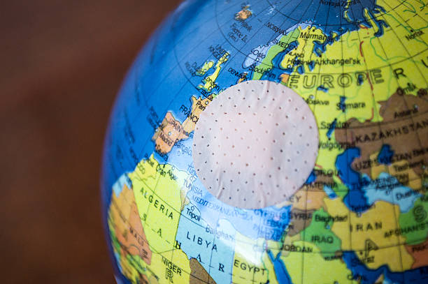istock Globe with Small Bandaid/Plaster Over Europe 497640458