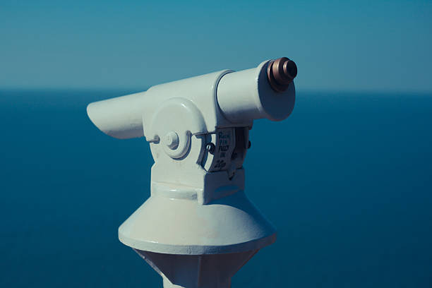 istock Coin operated telescope by the sea 497641443