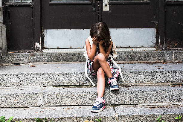 istock eight years old school girl 497656276