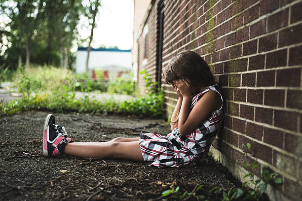 istock eight years old school girl 497656436