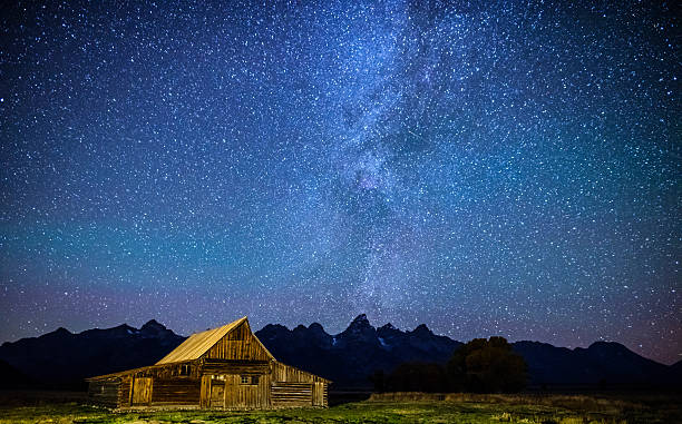 istock Star filled night over Mormon Row Barn GTNP 497658688