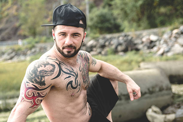 istock sexy man with tattoo 497662228