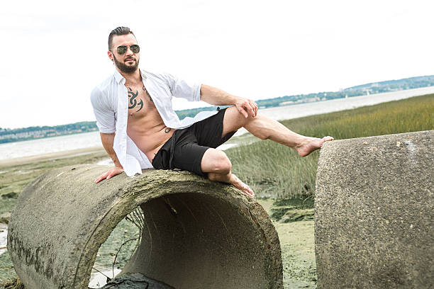 istock sexy man with tattoo 497662276