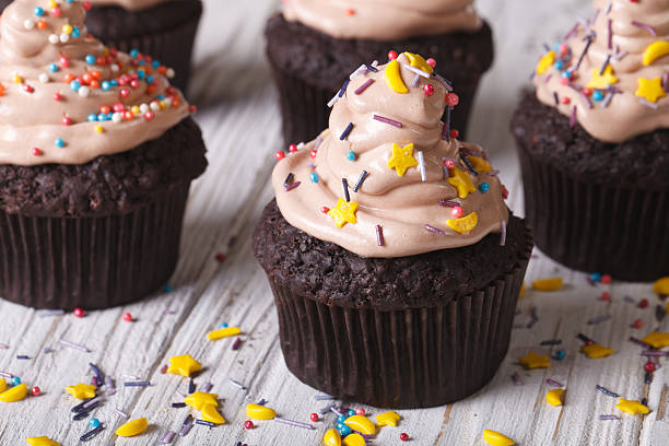 istock Chocolate cupcakes decorated with stars and moon horizontal 497665588