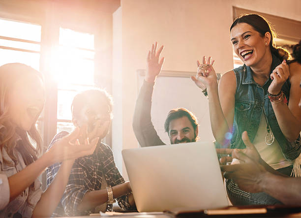 istock Cheerful start up team celebrating their business achievement. 497677784