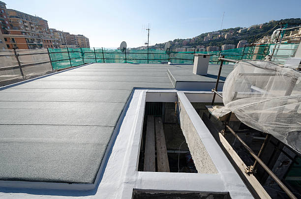 Finishing the roof of a building stock photo