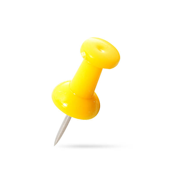 istock close up of a pushpin on white background 497684229