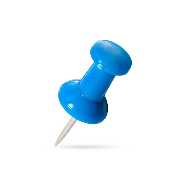 istock close up of a pushpin on white background 497684233