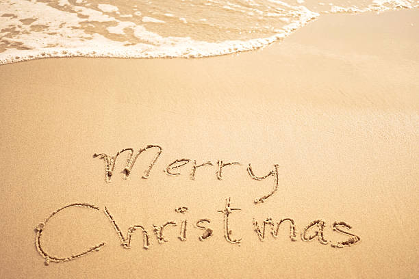 istock Merry Christmas text on the beach 497684846