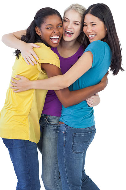 istock Diverse laughing women embracing each other 497686513
