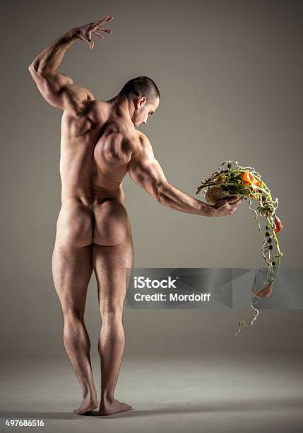 Hercules With Flower Arrangement Stock Photo - Download Image Now - Naked, Art, Males