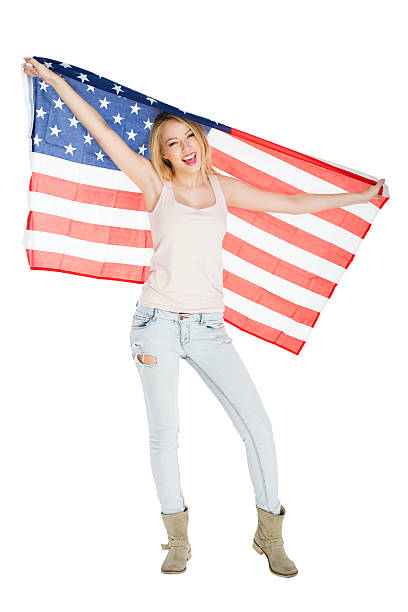 istock Woman with American flag 497687549