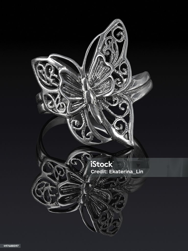 Silver ring butterfly Silver ring butterfly-shaped with reflection - clipping path included. Art Stock Photo