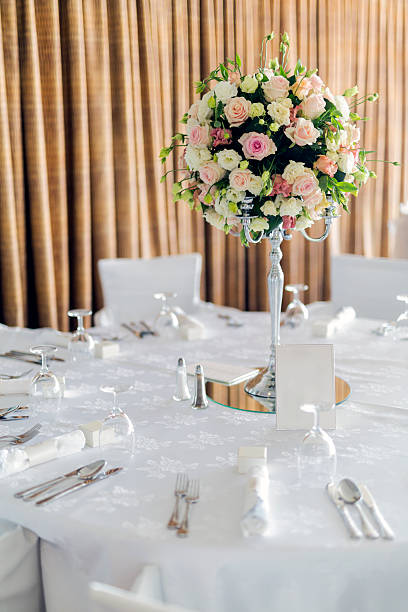 istock Beautiful wedding tables and roses 497690262