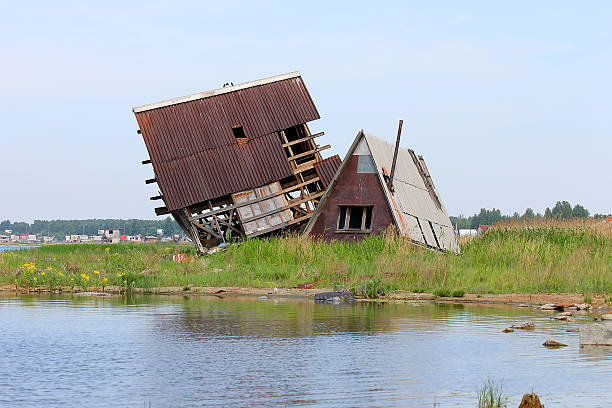 istock Roof destroyed houses 497691813