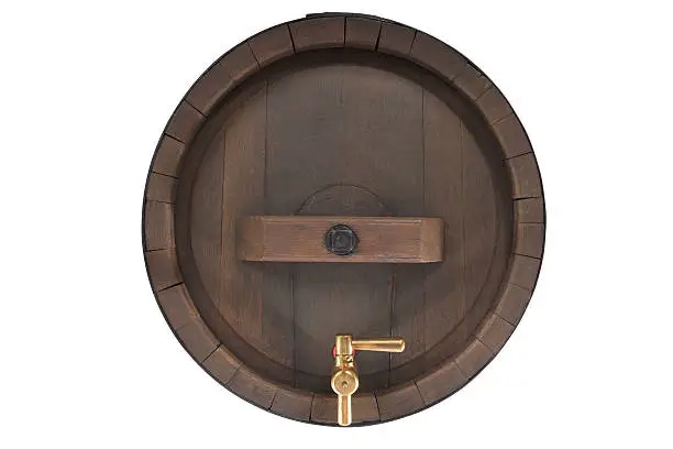 old oak beer barrel with brazen spigot isolated on white