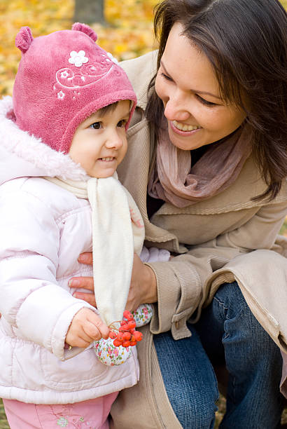 istock mom and child at nature 497703190