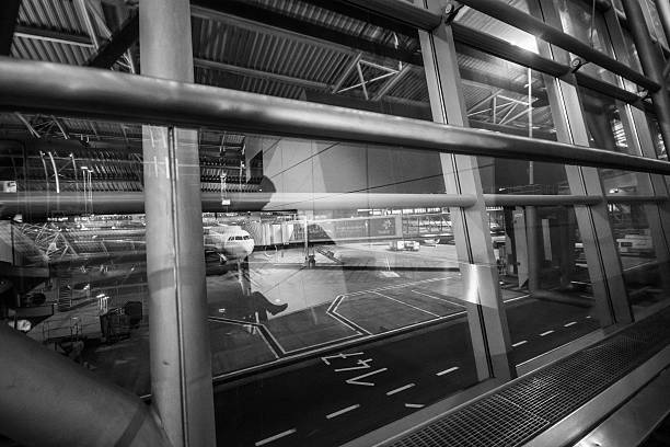 istock Airport terminal. Airplane behind the window. 497703850