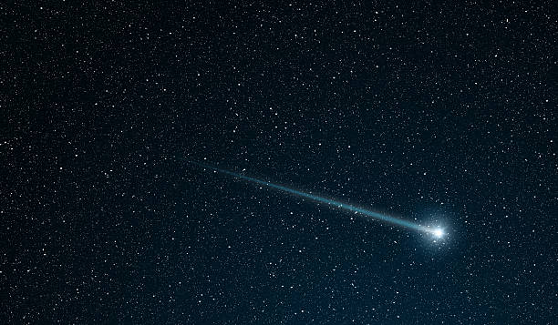 shooting star shooting star going across the star field comet stock pictures, royalty-free photos & images
