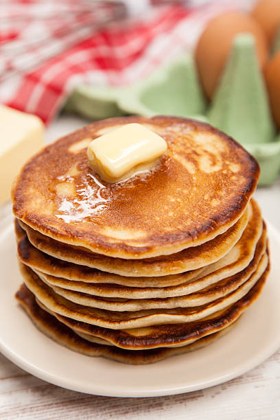 istock High pile of delicious pancakes 497704746
