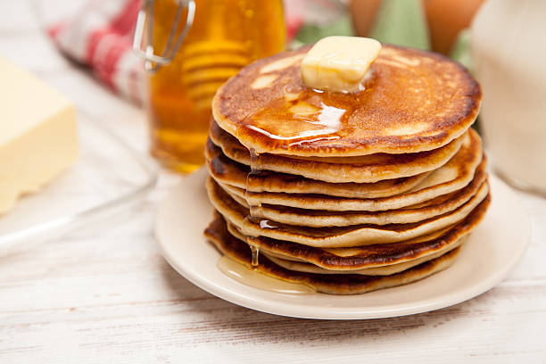 istock High pile of delicious pancakes 497704882
