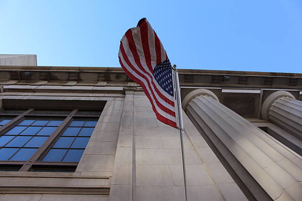 istock USA flag hanging from building 497706124