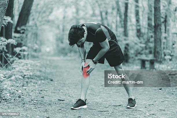 Man With Knee Fracture Stock Photo - Download Image Now - 2015, Adult, Anaerobic Exercise