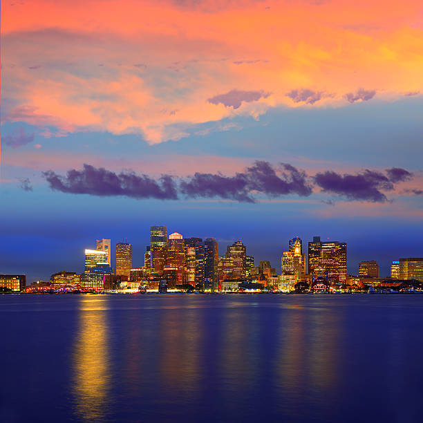istock Boston skyline at sunset and river in Massachusetts 497709422
