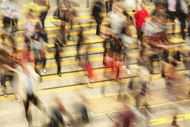 istock Motion Blur of Commuters Crossing Road 497709515