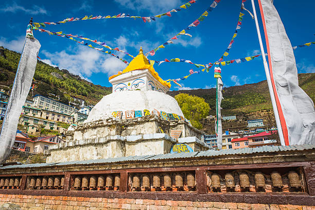 istock Buddhist stupa prayer flags Namche Bazaar Sherpa teahouses Himalayas Nepal 497710402