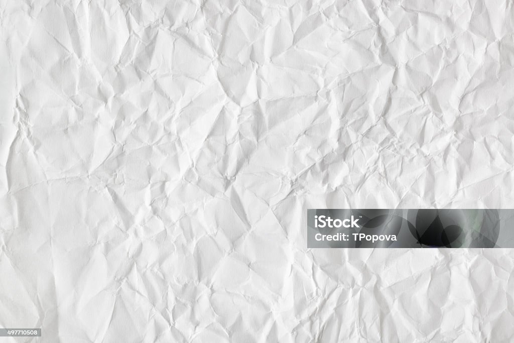 Crumpled paper background Crumpled white paper texture - abstract background Crumpled Paper Stock Photo