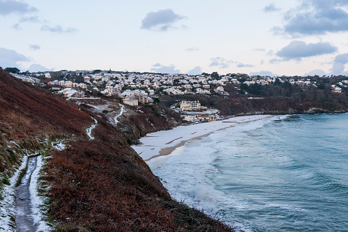 Carbis Bay beach with snow near St Ives in Cornwall