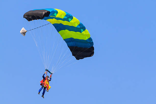 istock Skydiving photo. Tandem. 497710932