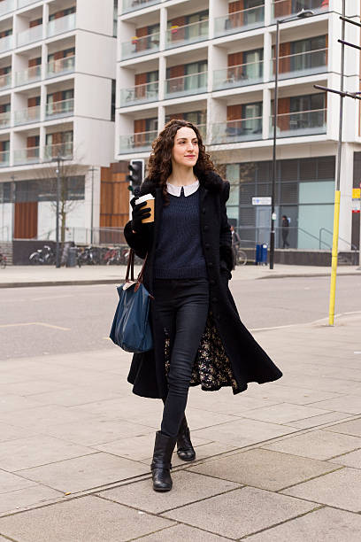 istock casual girl with coffee 497711180