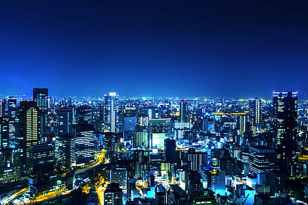 japan osaka panorama bei nacht - region kinki stock-fotos und bilder