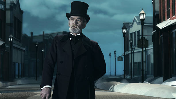 istock Dickens Scrooge Man in Old Winter Street. 497713274